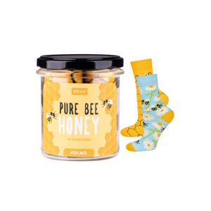 Modro-žlté vzorované ponožky v pohári Pure Bee Honey